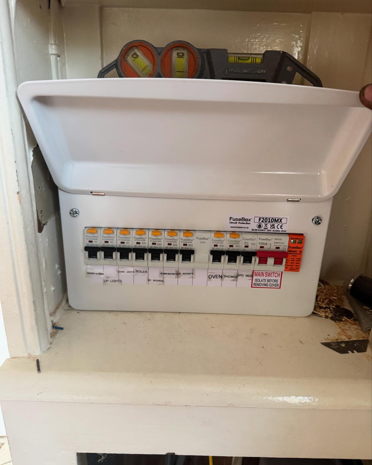 Electrical fuse box in cabinet