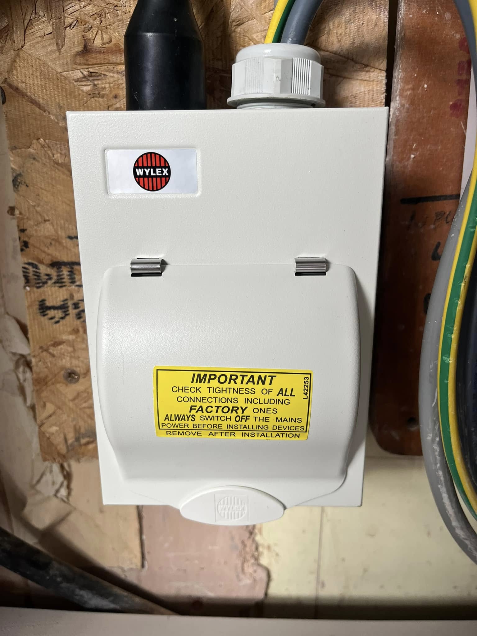 Small electrical fuse box on wall